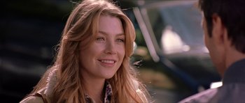 Movie still from “Old School” (2003), directed by Todd Phillips – A person with long blonde hair; Close Up shot, Over the shoulder angle