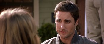 Movie still from “Old School” (2003), directed by Todd Phillips – A person wearing a jacket; Close Up shot, Over the shoulder angle