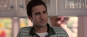 Movie still from “Old School” (2003), directed by Todd Phillips – A person sitting in a room; Close Up shot, Over the shoulder angle