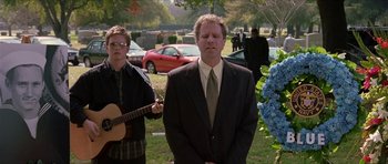 Movie still from “Old School” (2003), directed by Todd Phillips – A man and a woman standing in front of a tree; Medium shot, Over the shoulder angle