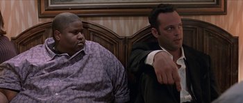 Movie still from “Old School” (2003), directed by Todd Phillips – Two men sitting next to each other in a room; Medium shot, Low angle