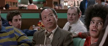 Movie still from “Old School” (2003), directed by Todd Phillips – Two men sitting at a table in a restaurant; Close Up shot, Low angle