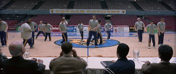 Movie still from “Old School” (2003), directed by Todd Phillips – A group of men are performing on a court; Extreme Wide shot, High angle