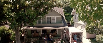Movie still from “Old School” (2003), directed by Todd Phillips – A house that is being remodeled with many boxes; Wide shot, Low angle