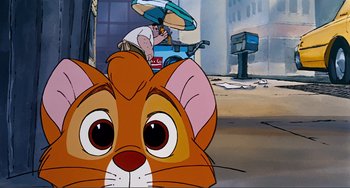 Movie still from “Oliver & Company” (1988), directed by George Scribner – An animated character is sitting in front of a cat; Close Up shot, Low angle