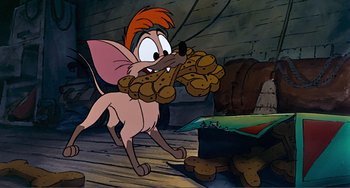 Movie still from “Oliver & Company” (1988), directed by George Scribner – A mouse holding a bunch of food in its mouth; Medium shot, High angle