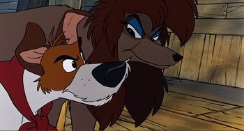 Movie still from “Oliver & Company” (1988), directed by George Scribner – A dog's face with another dog in the background; Close Up shot, Low angle