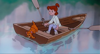 Movie still from “Oliver & Company” (1988), directed by George Scribner – A girl and a cat are in a small boat; Wide shot, High angle