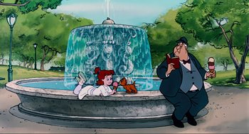 Movie still from “Oliver & Company” (1988), directed by George Scribner – An animated scene of a woman lying on the ground next to a fountain; Wide shot, High angle