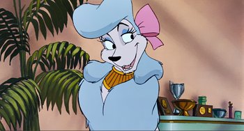 Movie still from “Oliver & Company” (1988), directed by George Scribner – A picture of a cartoon character with a trophy; Close Up shot, Over the shoulder angle