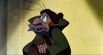 Movie still from “Oliver & Company” (1988), directed by George Scribner – An animated picture of an evil looking character; Close Up shot, Low angle