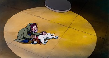 Movie still from “Oliver & Company” (1988), directed by George Scribner – An animated scene of a woman holding onto a dog; Wide shot, High angle