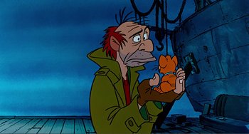 Movie still from “Oliver & Company” (1988), directed by George Scribner – An old man holding a cat while looking at a cell phone; Close Up shot, Low angle