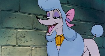 Movie still from “Oliver & Company” (1988), directed by George Scribner – A cartoon of a mouse wearing a blue outfit; Close Up shot, Over the shoulder angle