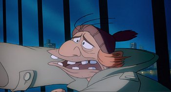Movie still from “Oliver & Company” (1988), directed by George Scribner – An animated picture of an evil looking character; Close Up shot, Low angle