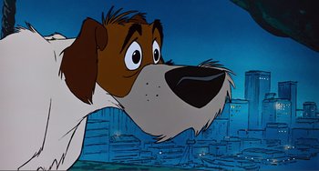 Movie still from “Oliver & Company” (1988), directed by George Scribner – A cartoon of a brown and white dog with a city in the background; Close Up shot, Low angle