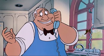 Movie still from “Oliver & Company” (1988), directed by George Scribner – An animated character is holding a phone up to his ear; Close Up shot, Low angle