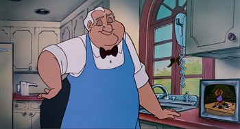 Movie still from “Oliver & Company” (1988), directed by George Scribner – An animated picture of an old man standing in front of a kitchen sink; Medium shot, Low angle