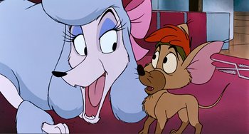 Movie still from “Oliver & Company” (1988), directed by George Scribner – A dog and a cat are looking at each other in a cartoon; Close Up shot, Over the shoulder angle