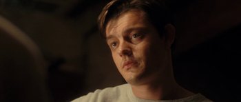 Movie still from “On the Road” (2012), directed by Walter Salles – A person looking at the camera; Close Up shot, Low angle