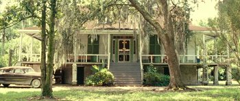 Movie still from “On the Road” (2012), directed by Walter Salles – A large house with a porch and steps leading up to it; Extreme Wide shot, Low angle