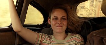 Movie still from “On the Road” (2012), directed by Walter Salles – A person sitting in a car; Close Up shot, Low angle