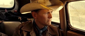 Movie still from “On the Road” (2012), directed by Walter Salles – A man wearing a cowboy hat sitting in a vehicle; Close Up shot, Low angle