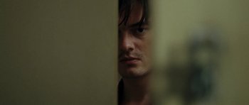 Movie still from “On the Road” (2012), directed by Walter Salles – A person with a beard; Close Up shot, Over the shoulder angle