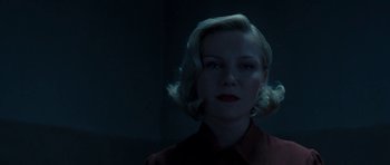 Movie still from “On the Road” (2012), directed by Walter Salles – A woman with blonde hair wearing a red shirt; Close Up shot, Low angle