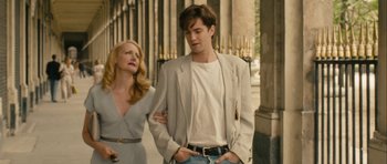 Movie still from “One Day” (2011), directed by Lone Scherfig – A man and a woman walking down a street; Medium shot, Over the shoulder angle