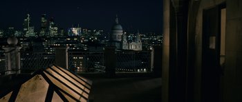 Movie still from “One Day” (2011), directed by Lone Scherfig – A view of a city at night from a balcony; Extreme Wide shot, High angle
