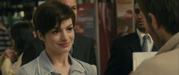Movie still from “One Day” (2011), directed by Lone Scherfig – A person with short hair; Close Up shot, Over the shoulder angle