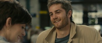 Movie still from “One Day” (2011), directed by Lone Scherfig – A person wearing a jacket; Close Up shot, Over the shoulder angle