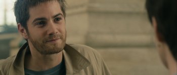 Movie still from “One Day” (2011), directed by Lone Scherfig – A person wearing a jacket; Close Up shot, Over the shoulder angle