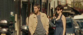 Movie still from “One Day” (2011), directed by Lone Scherfig – A man and a woman standing next to each other on the street; Medium shot, Over the shoulder angle