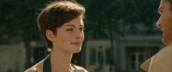 Movie still from “One Day” (2011), directed by Lone Scherfig – A person with short brown hair; Close Up shot, Over the shoulder angle