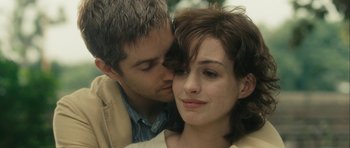 Movie still from “One Day” (2011), directed by Lone Scherfig – A person and a man face to face; Close Up shot, Over the shoulder angle