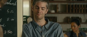 Movie still from “One Day” (2011), directed by Lone Scherfig – A man with his eyes closed and his head tilted to the side; Close Up shot, Over the shoulder angle