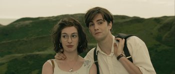 Movie still from “One Day” (2011), directed by Lone Scherfig – A man and a woman standing next to each other; Close Up shot, Low angle