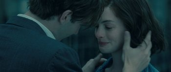Movie still from “One Day” (2011), directed by Lone Scherfig – A young man and a young woman looking into each others eyes; Close Up shot, Over the shoulder angle