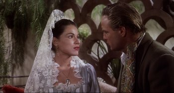 Movie still from “One-Eyed Jacks” (1961), directed by Marlon Brando – A man and a woman in wedding attire; Close Up shot, Over the shoulder angle