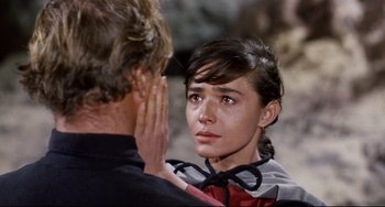 Movie still from “One-Eyed Jacks” (1961), directed by Marlon Brando – A man and a woman looking at one another; Close Up shot, Over the shoulder angle