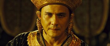 Movie still from “Ong Bak 2” (2008), directed by Tony Jaa – A person wearing a costume; Close Up shot, Low angle