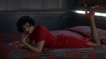 Movie still from “Open Your Eyes” (1997), directed by Alejandro Amenábar – A woman in a red dress laying on a bed; Medium shot, High angle