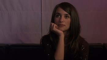 Movie still from “Open Your Eyes” (1997), directed by Alejandro Amenábar – A beautiful young lady sitting in front of a window; Close Up shot, Over the shoulder angle