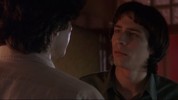 Movie still from “Open Your Eyes” (1997), directed by Alejandro Amenábar – A man and a woman are looking at one another; Close Up shot, Over the shoulder angle
