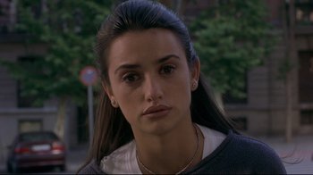 Movie still from “Open Your Eyes” (1997), directed by Alejandro Amenábar – A person with long black hair; Close Up shot, Over the shoulder angle
