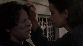 Movie still from “Open Your Eyes” (1997), directed by Alejandro Amenábar – A woman putting makeup on another woman's face; Close Up shot, Over the shoulder angle