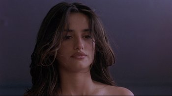 Movie still from “Open Your Eyes” (1997), directed by Alejandro Amenábar – A beautiful young woman with long , brown hair; Close Up shot, Low angle