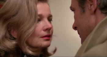 Movie still from “Opening Night” (1977), directed by John Cassavetes – A man and a woman face to face in front of a wall; Close Up shot, Over the shoulder angle